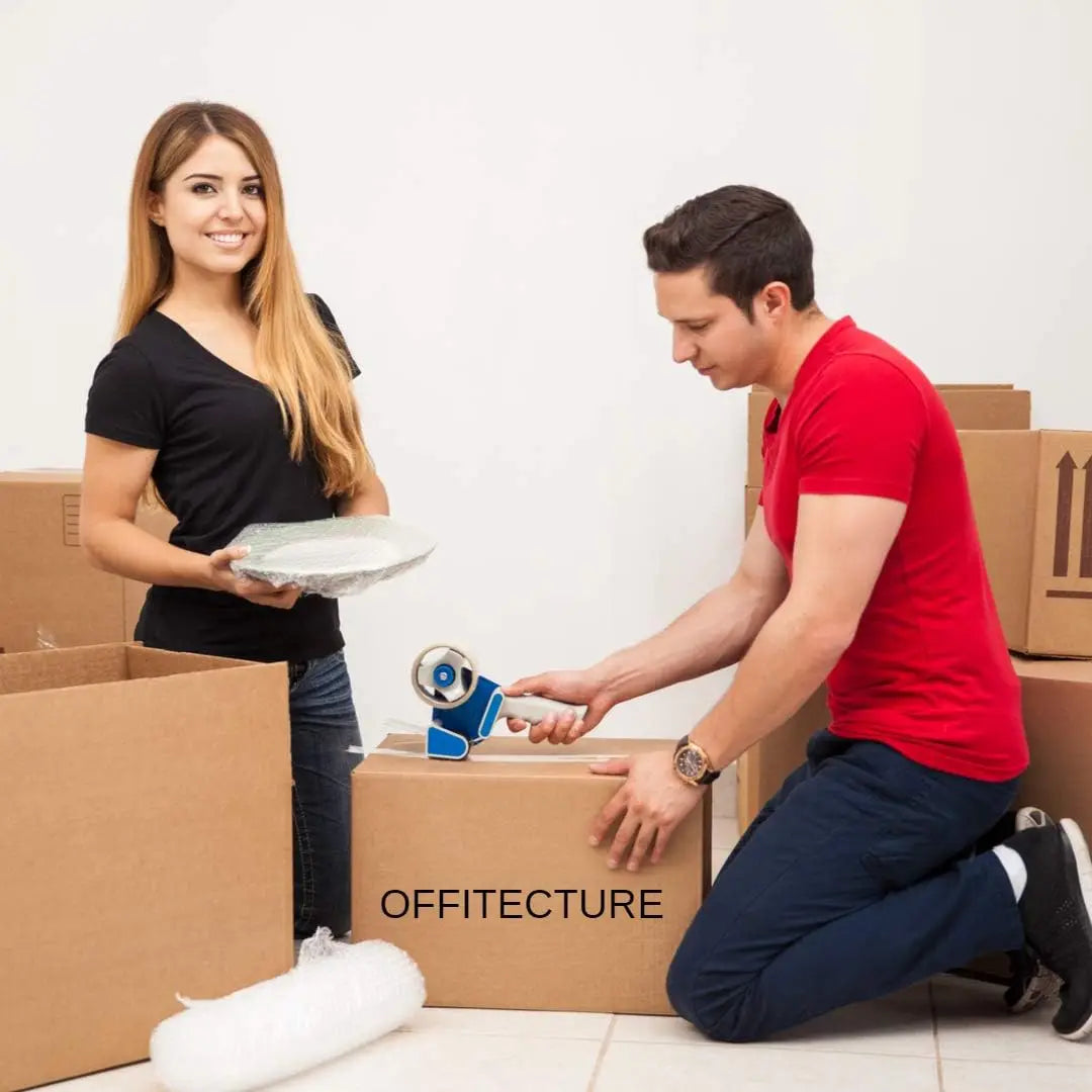 man and woman using bubble wrap to pack boxes